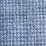 Close-up of the light blue cotton oxford basket weave showing interlaced warp and weft threads and natural fibre slubs