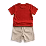 Back view of the children's t-shirt and shorts set in red and stone, plain tee back and shorts with two welt back pockets