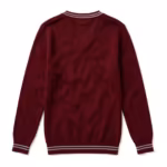Back view of the burgundy school sweater with a plain back panel, the striped neck band seen from behind and striped ribbed cuffs and hem