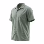 Chefs cook shirt in sage green poly-cotton poplin, three-quarter angle showing the open collar, button front and chest pocket