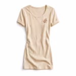 Ladies fashion design t-shirt in warm cream cotton jersey, full front view with scoop neck, rolled sleeves and a small embroidered floral sprig on the left chest