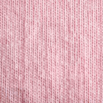 Close-up of the soft pink cotton single jersey showing the fine knit stitch columns, yarn texture and natural fibre fly