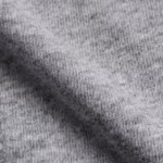 Close-up of the grey marl cotton single jersey of the ladies vest tops, showing the fine knit loops and heathered yarn fibres