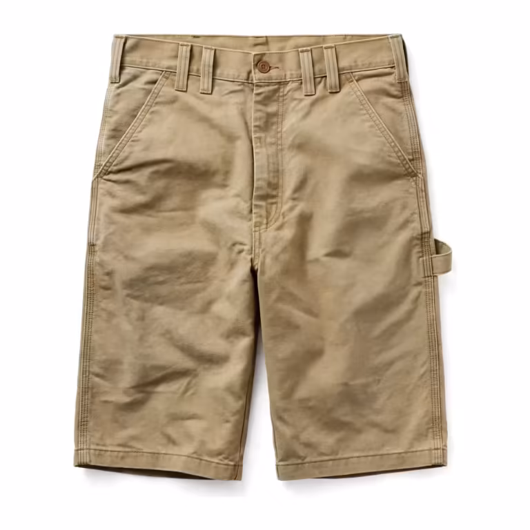 Men's heavy canvas work shorts in khaki cotton duck, full front view with button waistband, wide belt loops, deep slanted pockets and a hammer loop